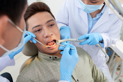 Cara Membersihkan Karang Gigi